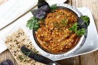 Икра из баклажан с помидорами и орехами